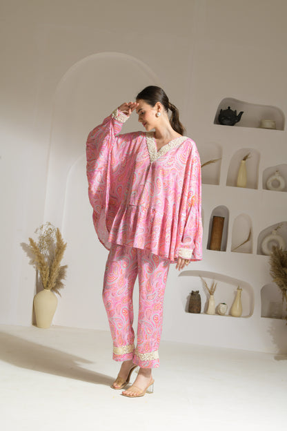 Bahaar Pink Paisley Print Poncho style top with Embroidered pearl neckline and straight fit pants - Set of 2