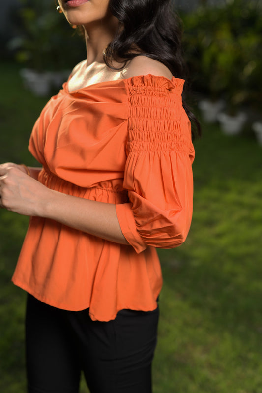 Jessika oﬀ-shoulder Smocked Peplum Top - Orange